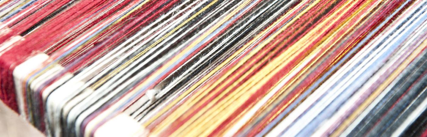 coloured folders in filing cabinet